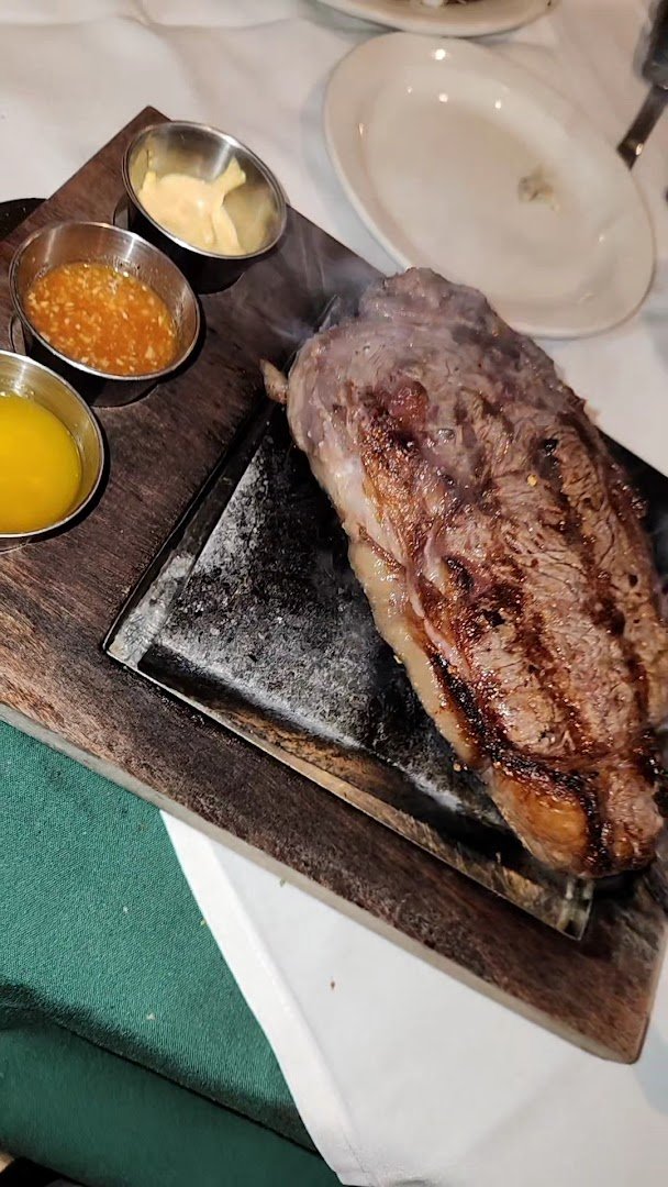 Restaurant table with wine and seafood