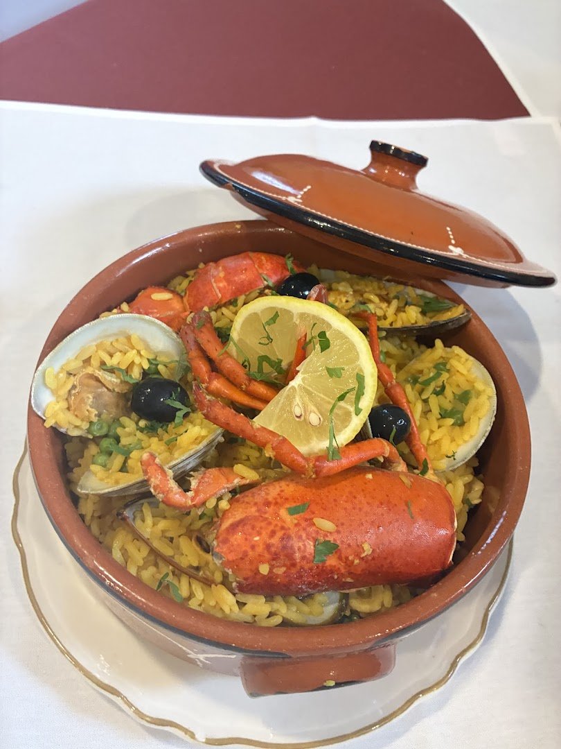 Restaurant table with wine and seafood